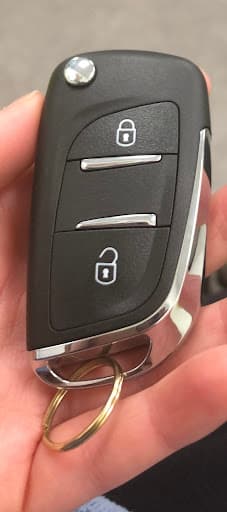 Car and House Key Cutting — Customer photo